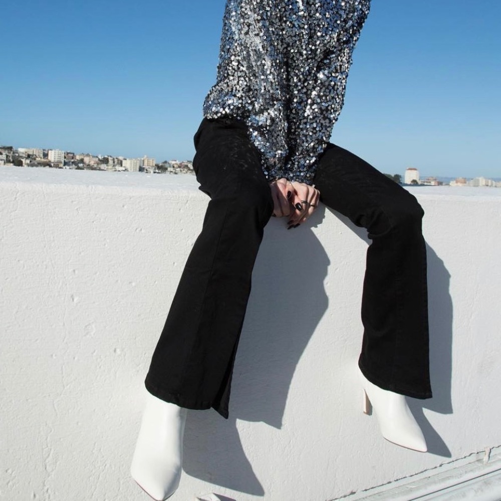 Flaired black cut out jeans
